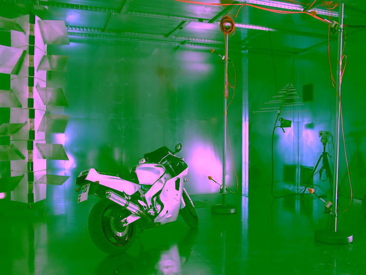 A look inside the (large) Reverberation Chamber at the Otto-von-Guericke-University Magdeburg, Germany. On the left side is the vertical Mode Stirrer (or Tuner), that changes the electromagnetic boundaries to ensure a (statistically) homogeneous field distribution.